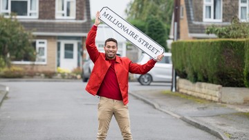 BUMPER NEW YEAR: Postcode Lottery's Danyl Johnson congratulated our winners