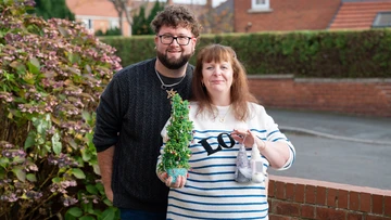 TREE-MENDOUS: Lindsey and Liam with some of her Christmas ornaments