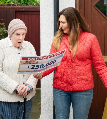 CHEQUE IT OUT: Maureen's shock when Presenter Judie McCourt unveils her prize