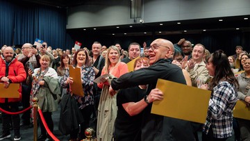 CLINCHED IT: Michelle and Brett hug when they realise she's a big winner