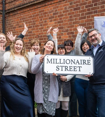 MASSIVE FOR MIND: Suffolk Mind CEO Jon Neal celebrates the funding news with his team