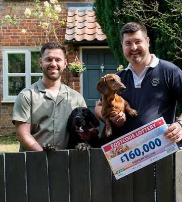 BARKING GLAD: Couple celebrate with dogs Harry and Bertie