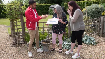 SALLY TALLY: Mum gets first of two cheques from Presenter Danyl Johnson