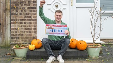 IT'S HALLO-WIN: Lee celebrates prize among his kids' pumpkins
