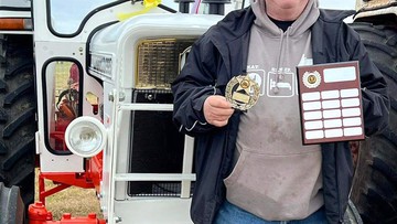 THE X TRACTOR: Farm helper David wins show with vintage vehicle