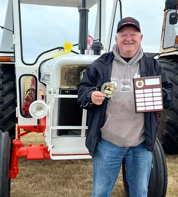 THE X TRACTOR: Farm helper David wins show with vintage vehicle
