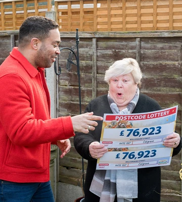 DOUBLE BUBBLE: Karen was emotional after getting two cheques from Danyl