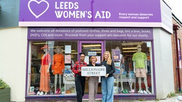 Samantha Lightfoot (centre) of Leeds Women's Aid outside their charity shop with Shop Supervisor Yolanda Nyamunda (left) and Marketing and Communications Manager Hannah Whyte (right)