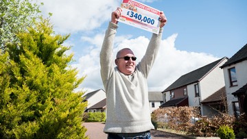 High Roller: Winner Garry holds up prize cheque