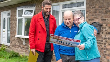 LOTTERY LOVE: Richard and Shirley hug after seeing their winnings