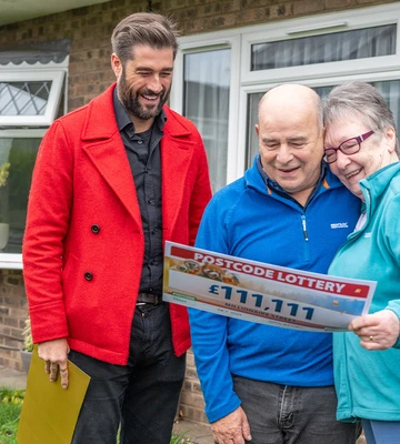 LOTTERY LOVE: Richard and Shirley hug after seeing their winnings