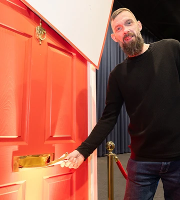 POSTMAN'S SHOCK: Andrew helped deliver golden envelopes - and won himself